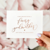 Fairy godmother proposal card with the text 'Every princess needs a fairy godmother, will you be mine?' in elegant script lettering. Perfect for godmother proposal occasions.