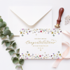 A beautifully designed custom wedding day card featuring elegant floral illustrations and personalized details, perfect for celebrating the newlyweds.