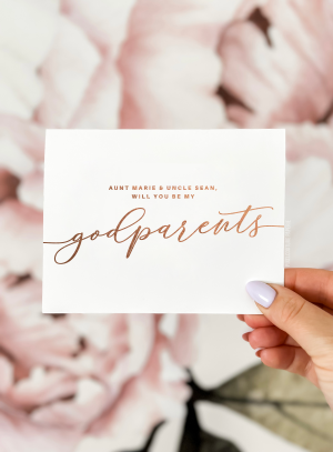 Classic “Will you be my godparents?” proposal card in elegant script on white cardstock, perfect for baptism or baby shower